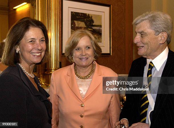 Sen. John Warner's, R-Va., fiancT, Jeanne Vander Myde , shares a laugh with Sharon Rockefeller at a party in the Strom Thurmond room in the Capitol...