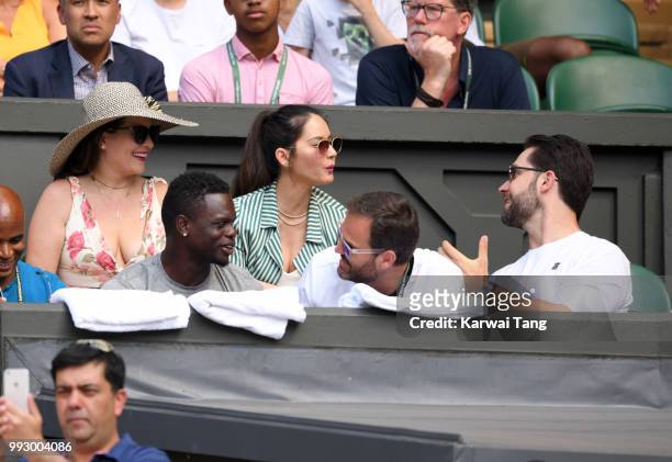 Cara McConnell, Olivia Munn and Alexis Ohanian attend day five of the Wimbledon Tennis Championships at the All England Lawn Tennis and Croquet Club...