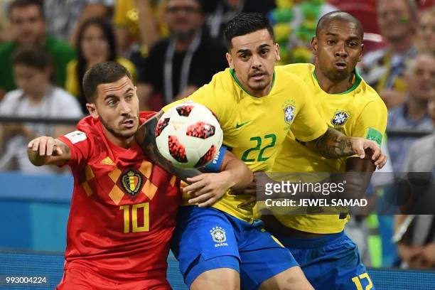 Belgium's forward Eden Hazard vies for the ball with Brazil's defender Fagner during the Russia 2018 World Cup quarter-final football match between...