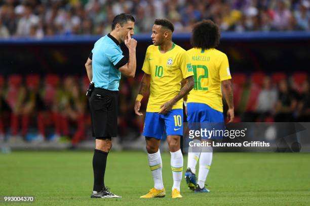 Referee Milorad Mazic speaks to Neymar Jr of Brazil after he dives inside the penalty area during the 2018 FIFA World Cup Russia Quarter Final match...