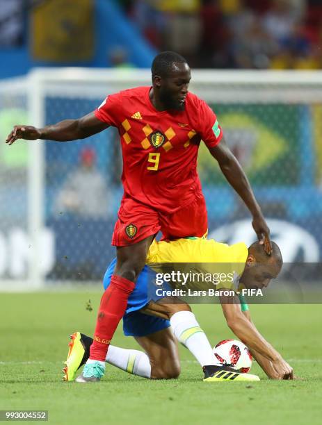 Romelu Lukaku of Belgium battles for possession with Miranda of Brazil during the 2018 FIFA World Cup Russia Quarter Final match between Brazil and...