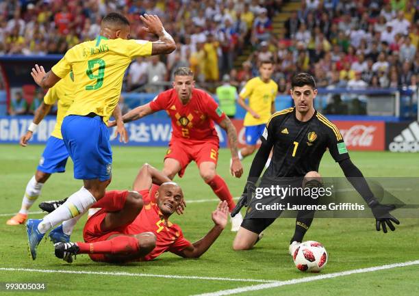 Gabriel Jesus of Brazil is tackled by Vincent Kompany of Belgium during the 2018 FIFA World Cup Russia Quarter Final match between Brazil and Belgium...