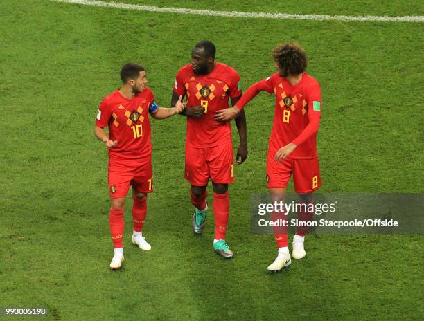 Eden Hazard, Romelu Lukaku and Marouane Fellaini of Belgium in discussion during the 2018 FIFA World Cup Russia Quarter Final match between Brazil...