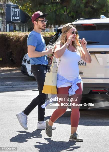 Hilary Duff and her boyfriend, Matthew Koma are seen on July 06, 2018 in Los Angeles, California.