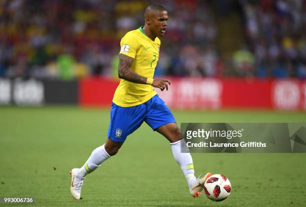 Douglas Costa of Brazil runs with the ball during the 2018 FIFA World Cup Russia Quarter Final match between Brazil and Belgium at Kazan Arena on...