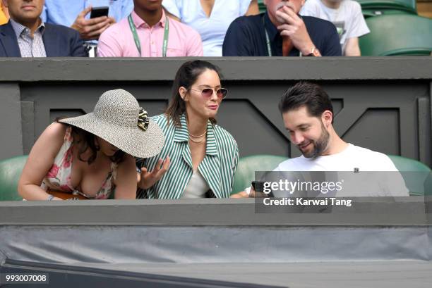 Cara McConnell, Olivia Munn and Alexis Ohanian attend day five of the Wimbledon Tennis Championships at the All England Lawn Tennis and Croquet Club...