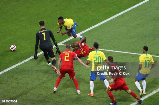 Gabriel Jesus of Brazil is tackled by Vincent Kompany of Belgium during the 2018 FIFA World Cup Russia Quarter Final match between Brazil and Belgium...