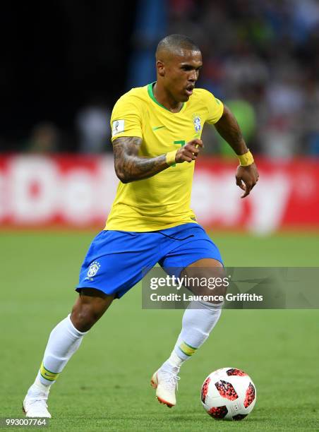 Douglas Costa of Brazil runs with the ball during the 2018 FIFA World Cup Russia Quarter Final match between Brazil and Belgium at Kazan Arena on...