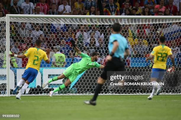 Brazil's goalkeeper Alisson looks at the ball during the Russia 2018 World Cup quarter-final football match between Brazil and Belgium at the Kazan...