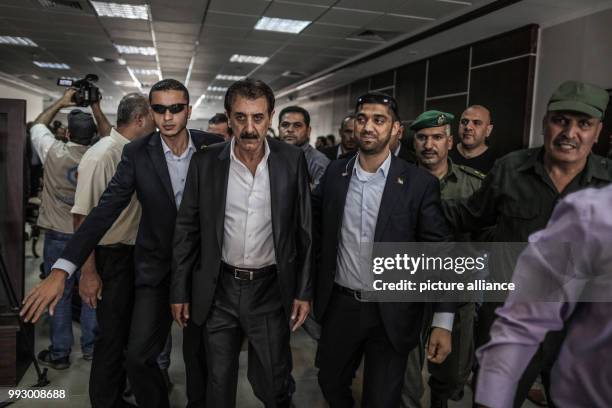 The Chairman of the Palestinian Crossing Authority, Nazmi Mhana , arrives at the Erez border crossing between Israel and Gaza in Beit Hanun, Gaza...