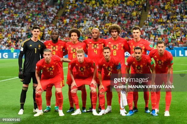 Belgium's goalkeeper Thibaut Courtois, Belgium's forward Romelu Lukaku, Belgium's midfielder Axel Witsel, Belgium's defender Vincent Kompany,...
