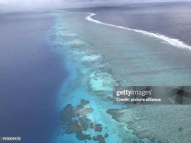 Reef can be seen before the Fiji Islands, 20 October 2017. The island state is host to the World Climate Conference COP23 which is to start on the...