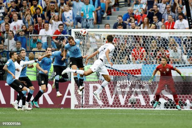Raphael Varane of France scores his team's first goal during of the 2018 FIFA World Cup Russia quarter final match between Uruguay and France at the...