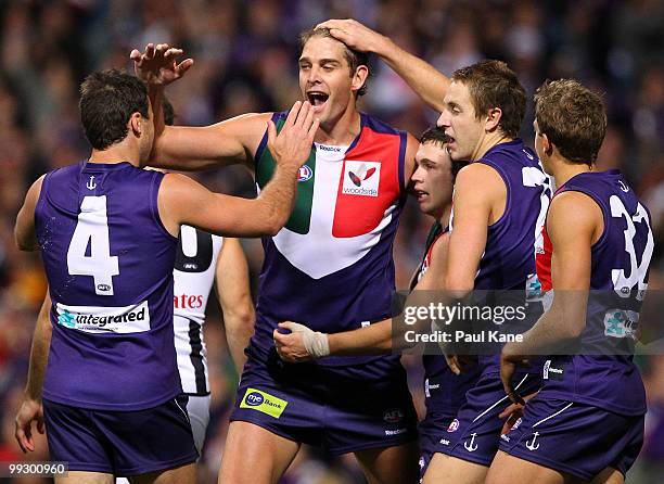 Aaron Sandilands of the Dockers celebrates a goal during the round eight AFL match between the Fremantle Dockers and the Collingwood Magpies at...