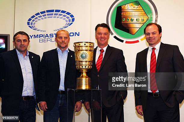 Manager Klaus Allofs, Head coach Thomas Schaaf of Werder Bremen, head coach Louis van Gaal and sports director Christian Nerlinger of Bayern Muenchen...