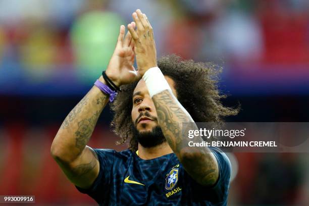 Brazil's defender Marcelo warms up before the Russia 2018 World Cup quarter-final football match between Brazil and Belgium at the Kazan Arena in...