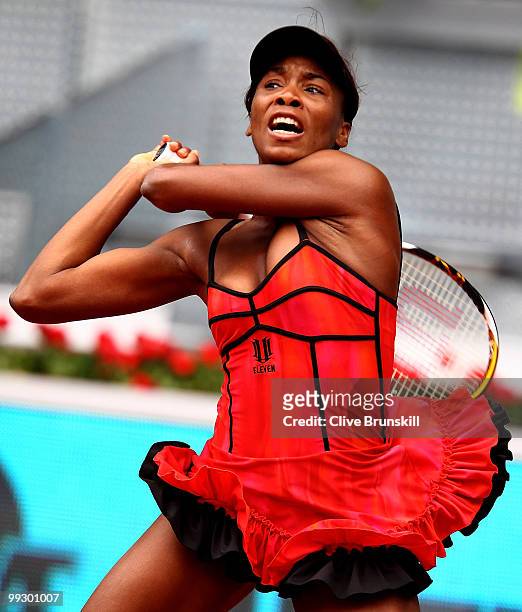 Venus Williams of the USA in action against Samantha Stosur of Australia in their quarter final match during the Mutua Madrilena Madrid Open tennis...