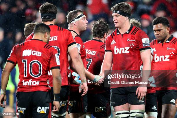 Wyatt Crockett and Scott Barrett of the Crusaders shake hands after the round 18 Super Rugby match between the Crusaders and the Highlanders at AMI...