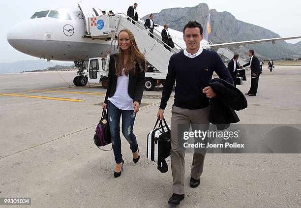 Piotr Trochowski of Germany and his girl friend Melanie are pictured at the arrival of the German National Team at the airport on May 14, 2010 in...