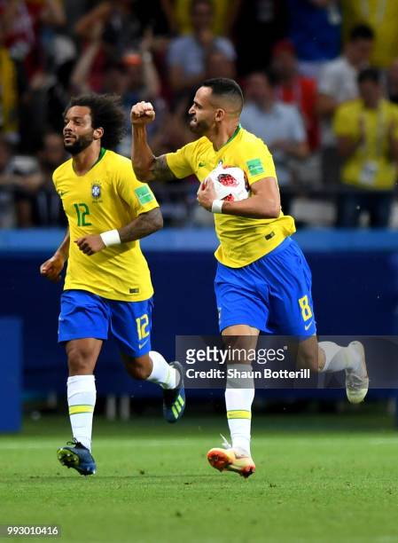 Renato Augusto of Brazil celebrates with team mate Marcelo after scoring his team's first goal during the 2018 FIFA World Cup Russia Quarter Final...