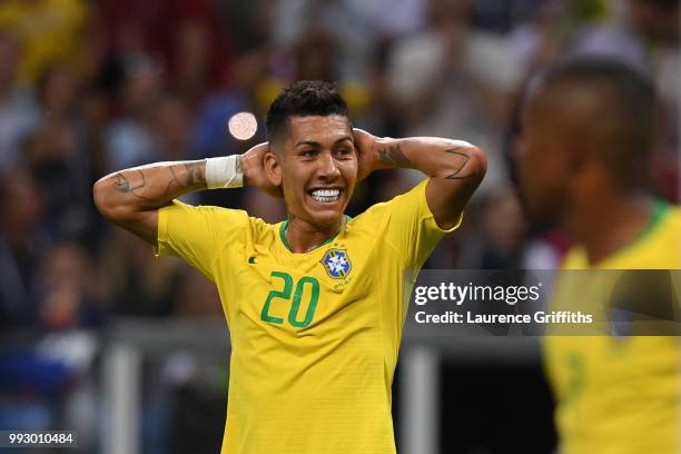 Roberto Firmino of Brazil recats during the 2018 FIFA World Cup Russia Quarter Final match between Brazil and Belgium at Kazan Arena on July 6, 2018...