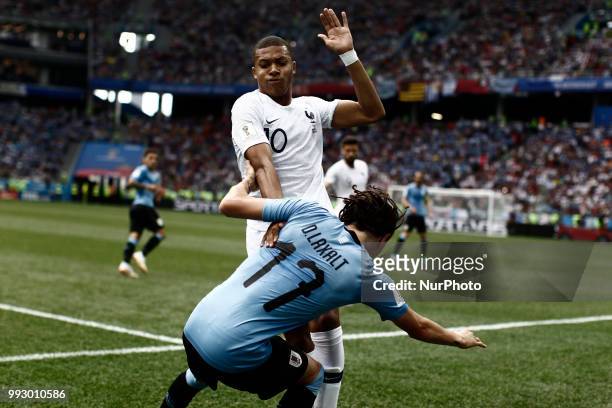 Kylian Mbappe, Diego Laxalt during 2018 FIFA World Cup Russia Quarter Final match between Uruguay and France at Nizhny Novgorod Stadium on July 6,...