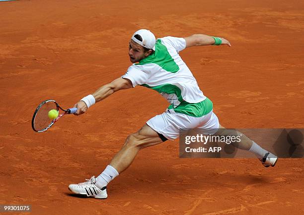 Austrian Jurgen Melzer returns a ball to Spaniard Nicolas Almagro during their Madrid Masters match on May 14, 2010 at the Caja Magic sports complex...