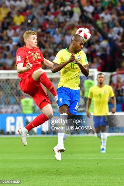 Belgium's midfielder Kevin De Bruyne vies for the ball with Brazil's midfielder Fernandinho during the Russia 2018 World Cup quarter-final football...