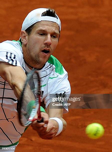 Austrian Jurgen Melzer returns a ball to Spaniard Nicolas Almagro during their Madrid Masters match on May 14, 2010 at the Caja Magic sports complex...