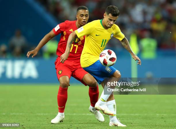 Philippe Coutinho of Brazil is challenged by Youri Tielemans of Belgium during the 2018 FIFA World Cup Russia Quarter Final match between Brazil and...
