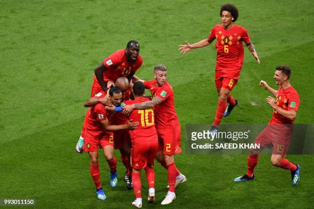 Belgium's players celebrate Brazil's own goal during the Russia 2018 World Cup quarter-final football match between Brazil and Belgium at the Kazan...