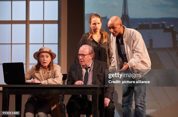 The actors Angela Schmid , Michael Prelle, Hannah Rebekka Ehlers and Patrick Abozen act during a photo rehearsal of 'Monsieur Claude und seine...