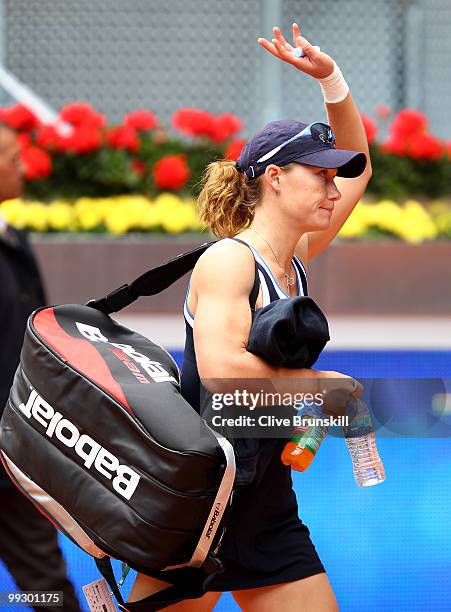 Samantha Stosur of Australia shows her dejection as she leaves the court after her straight sets defeat by Venus Williams of the USA in their quarter...