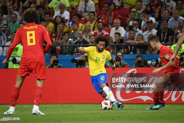 Brazil's defender Marcelo dribbles past Belgium's defender Thomas Meunier during the Russia 2018 World Cup quarter-final football match between...