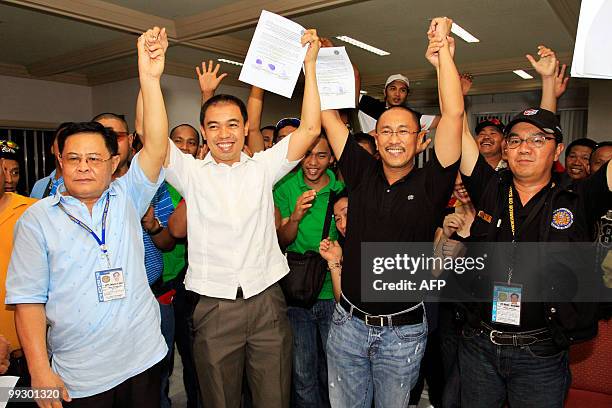 Esmael Mangudadatu is proclaimed as the new governor by Commission on elections officials during a ceremony at the provincial capitol in Shariff...