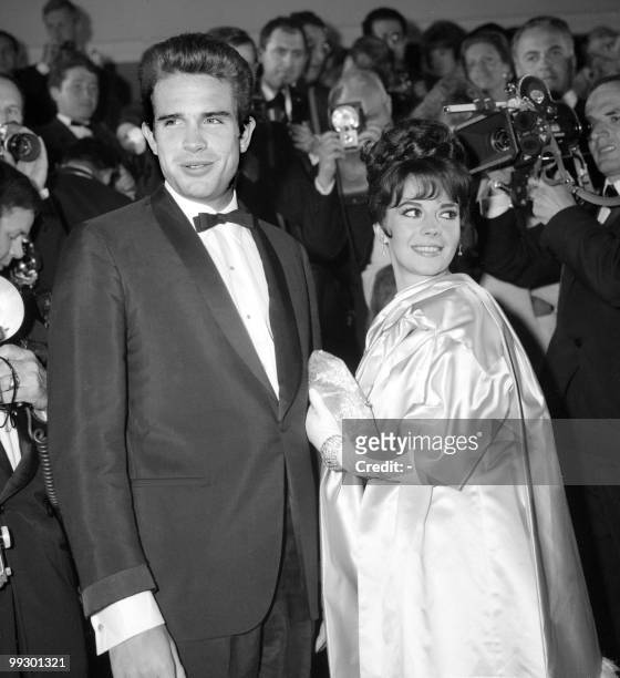 American actors Warren Beatty and Natalie Wood pose for the photographers at the Cannes Festival in May n1962. Actor and film-maker, born in...