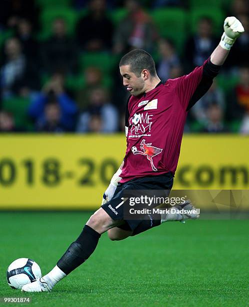 Dean Bouzanis of the Come Play XI kicks the ball back in to play during the Kevin Muscat Testimonial match between Melbourne Victory and the Come...