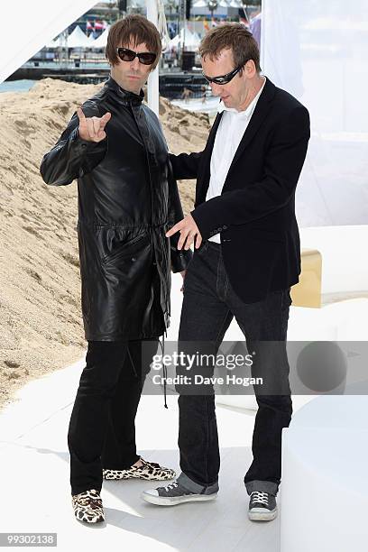 Liam Gallagher and Andrew Eaton attend "The Longest Cocktail Party" Photocall at the Terrazza Martini during the 63rd Annual Cannes Film Festival on...