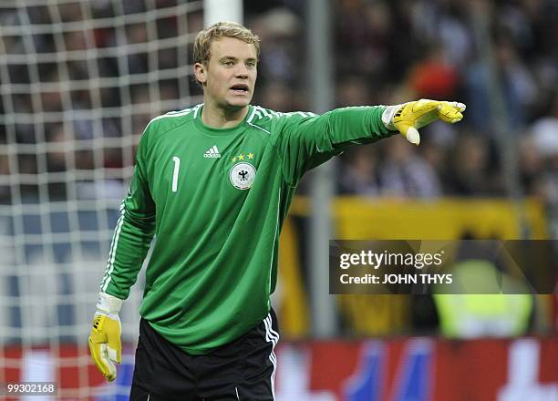 Germany's goalkeeper Manuel Neuer gestures during the friendly football match Germany vs Malta in the western German city of Aachen on May 13, 2010...