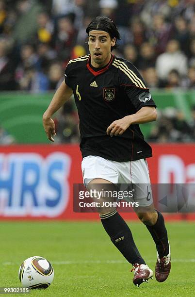 Germany's midfielder Samir Khedira runs with the ball during the friendly football match Germany vs Malta in the western German city of Aachen on May...
