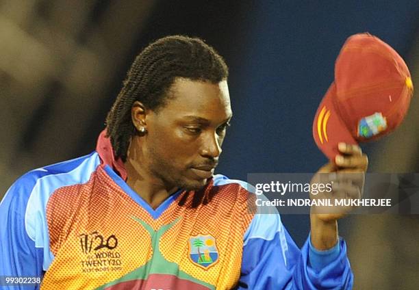 West Indies cricketer Chris Gayle takes off his cap after after the ICC World Twenty20 Super Eight match between West Indies and Australia at the...