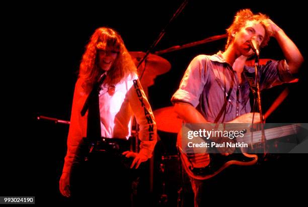 Singer Sting of The Police performs on stage at the Park West in Chicago, Illinois, May 25, 1979. The woman to his right is unidentified.