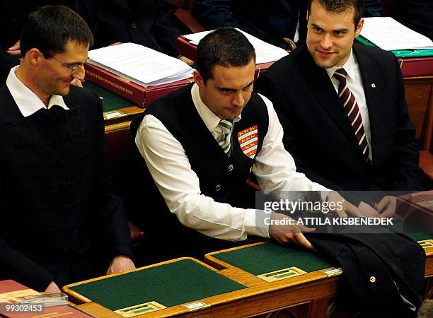 Members of the new 386-seat Hungarian Parliament take their representative-oath as party leader of Hungary's far-right Jobbik party Vona Gabor takes...