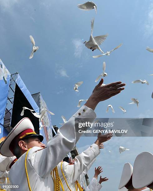 Ukrainian cadets release doves during a Victory Day parade in Kiev on May 9 marking the 65th anniversary of the end of World War II. AFP PHOTO /...