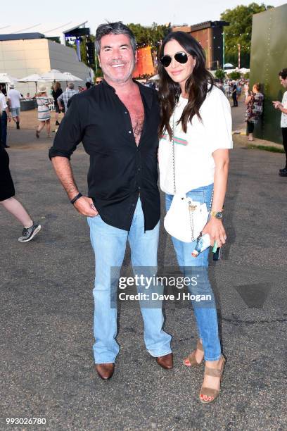 Simon Cowell and Lauren Silverman pose backstage as Barclaycard present British Summer Time Hyde Park at Hyde Park on July 6, 2018 in London, England.