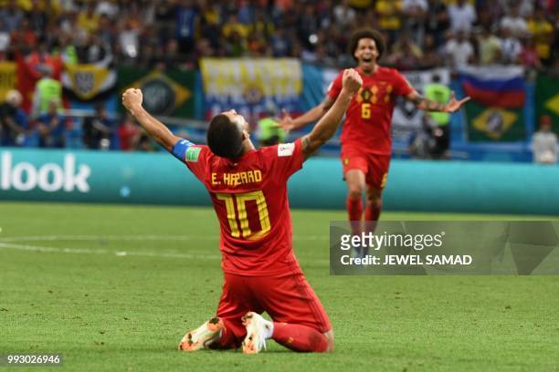 Belgium's forward Eden Hazard celebrates their win during the Russia 2018 World Cup quarter-final football match between Brazil and Belgium at the...