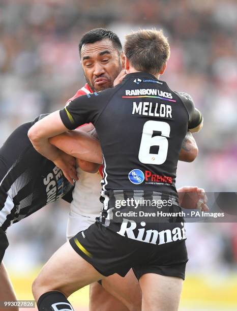 St Helens' Dominique Peyroux is tackled by Widnes Vikings' Joe Mellor during the Betfred Super League match at The Totally Wicked Stadium, St Helens.