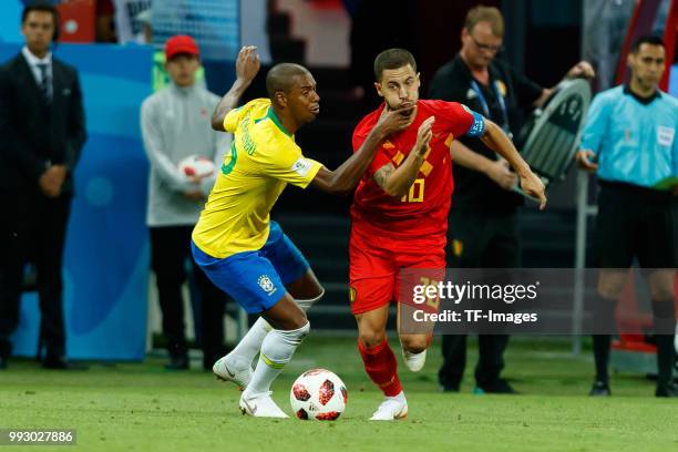 Fernandinho of Brazil and Eden Hazard of Belgium battle for the ball during the 2018 FIFA World Cup Russia Quarter Final match between Brazil and...