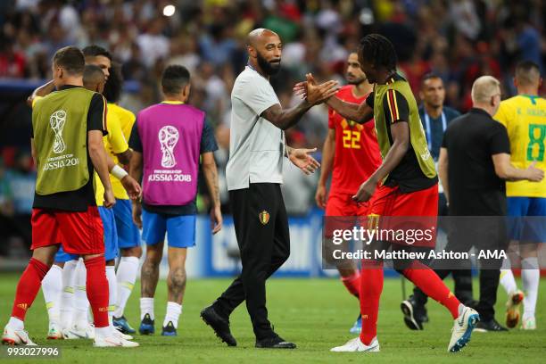 Thierry Henry assistant head coach / manager of Belgium celebrates at the end of the 2018 FIFA World Cup Russia Quarter Final match between Brazil...