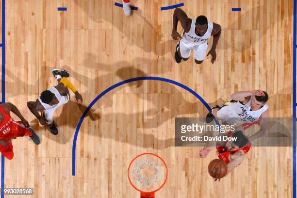 Zhou Qi of the Houston Rockets goes to the basket against the Indiana Pacers during the 2018 Las Vegas Summer League on July 6, 2018 at the Cox...